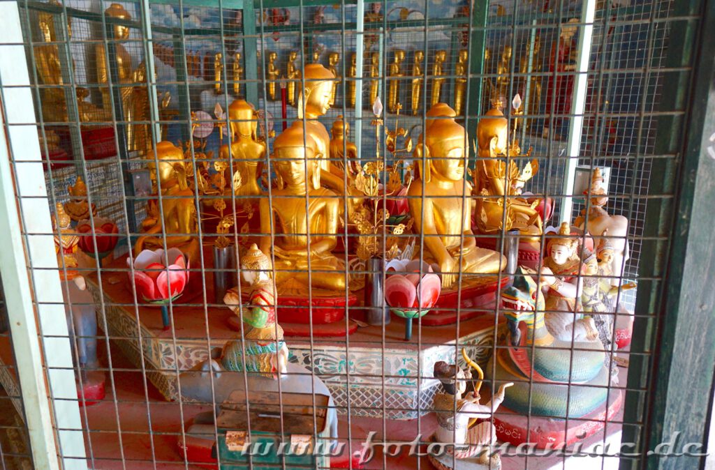 Buddhas hinter Gitter
