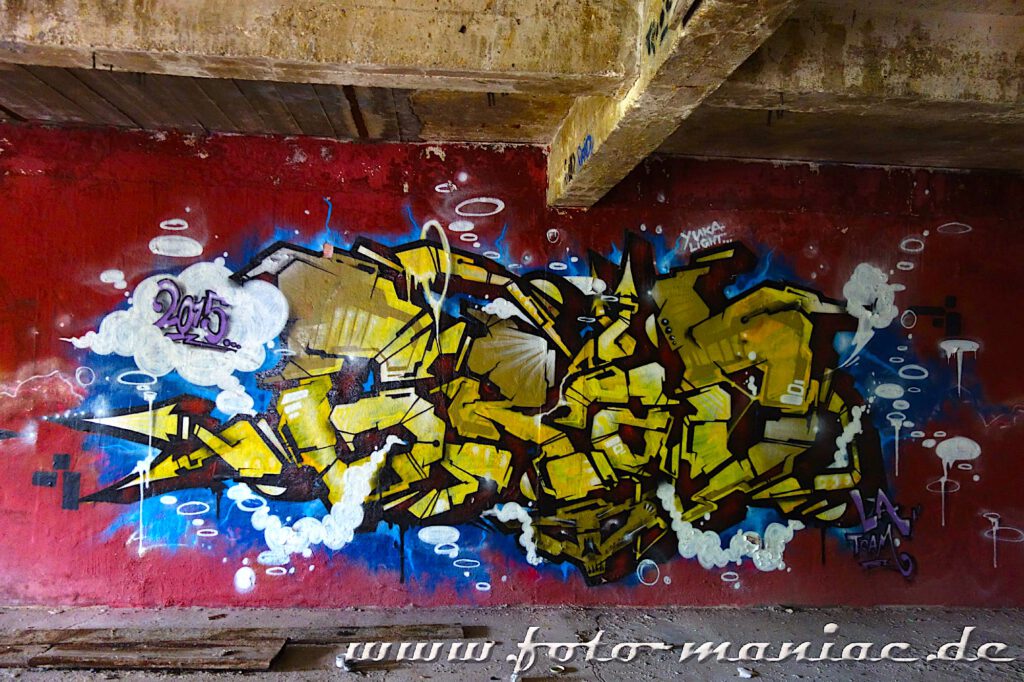Graffito an einer Putzwand