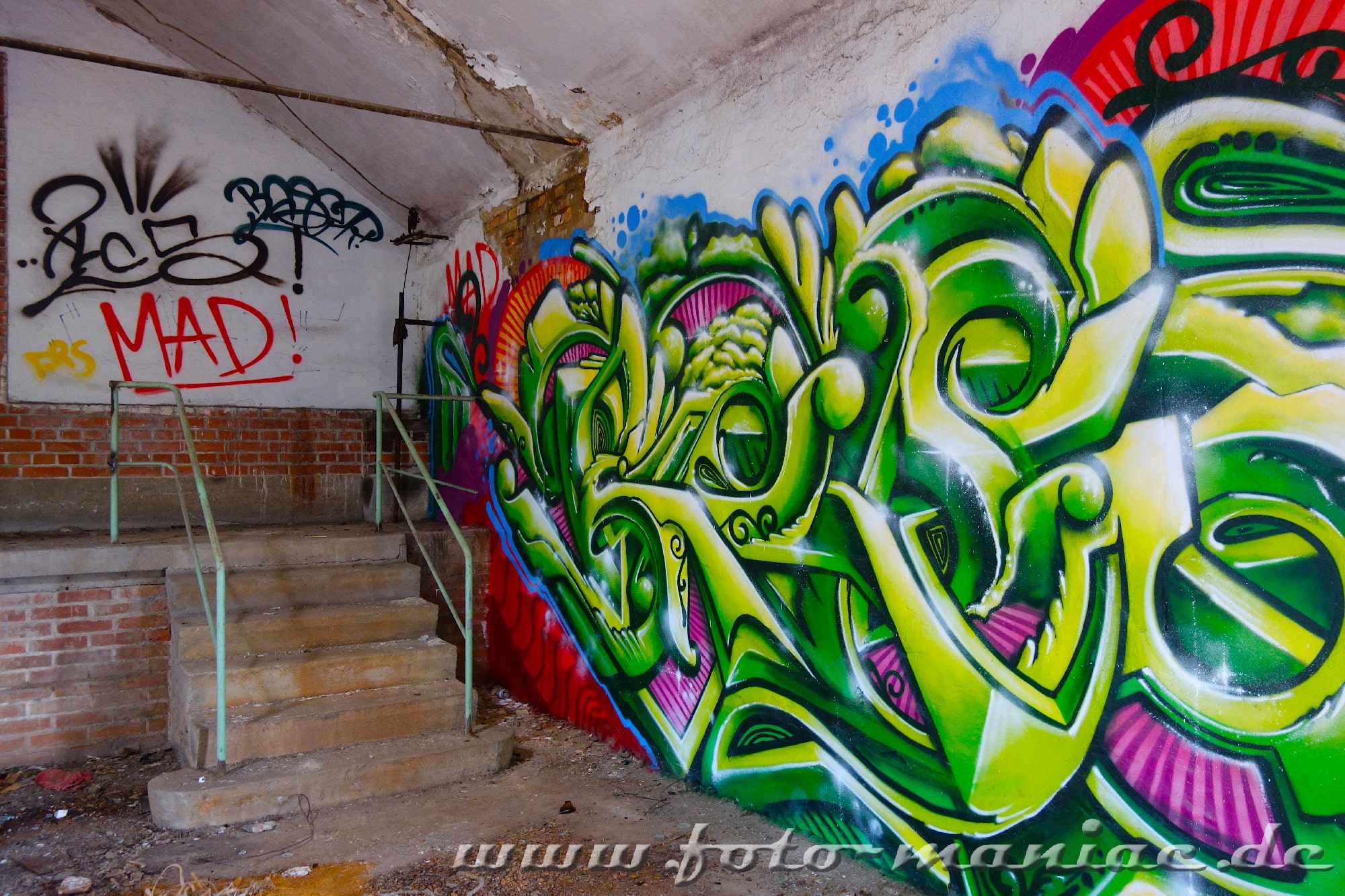 Graffiti an einem Treppenaufgang