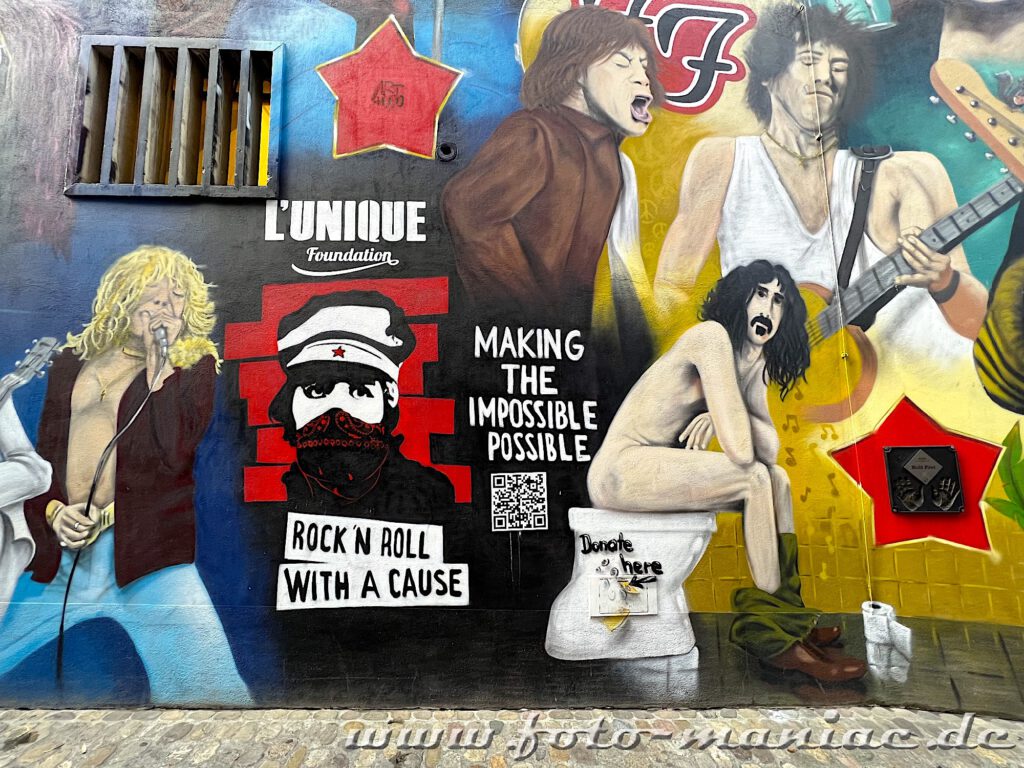 Bummel durch Basel: Rockstars auf einer Graffitiwand im Geerbergässlein